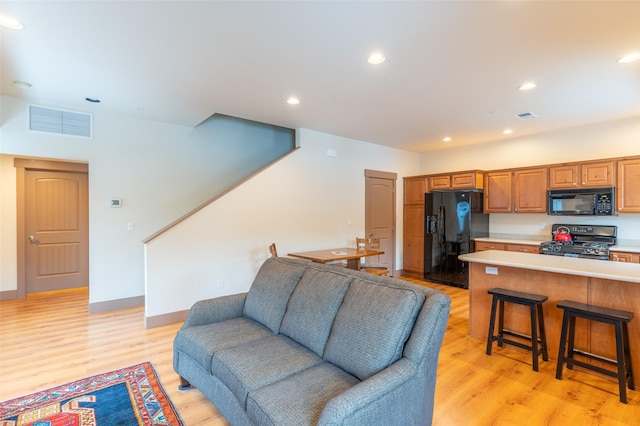 402 Sperry Ct, Whitefish, MT 59937 - living room featuring light wood-style floors and recessed lighting