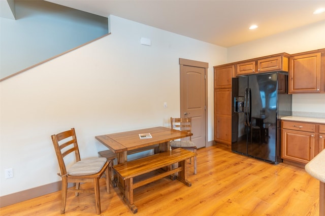 402 Sperry Ct, Whitefish, MT 59937 - dining area with light wood-style floors and recessed lighting