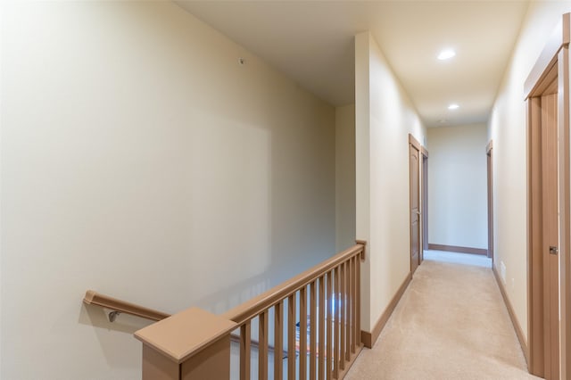 402 Sperry Ct, Whitefish, MT 59937 - hallway with recessed lighting, light carpet, and an upstairs landing