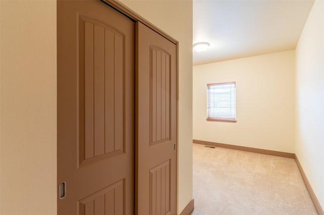 402 Sperry Ct, Whitefish, MT 59937 - hallway with light colored carpet and baseboards