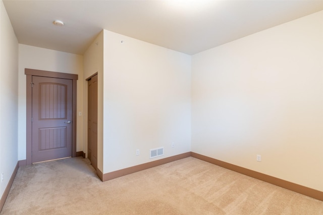 402 Sperry Ct, Whitefish, MT 59937 - unfurnished room with light carpet
