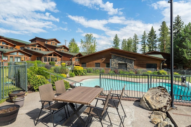 150 Adams St Unit 5, Lakeside, MT 59922 - view of pool with a patio