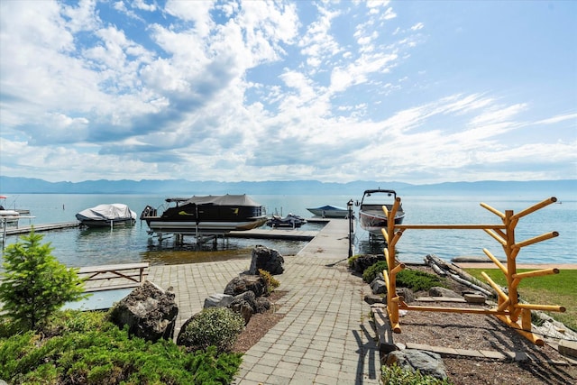 exterior space with boat lift and a boat dock