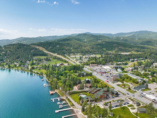 150 Adams St Unit 5, Lakeside, MT 59922 - aerial view of property and surrounding area featuring a water and mountain view and a forest