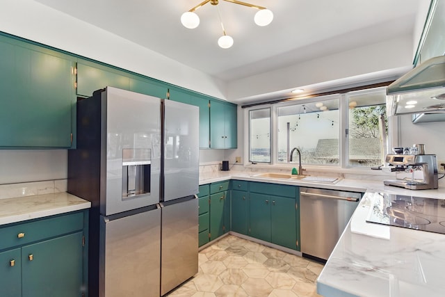 kitchen with a sink and appliances with stainless steel finishes