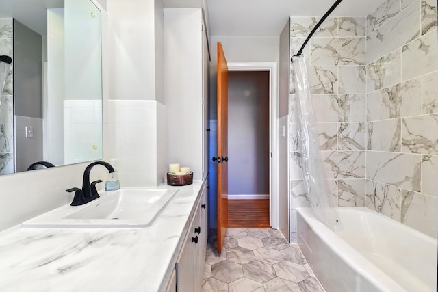 bathroom featuring shower / tub combo with curtain and vanity