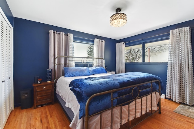 bedroom featuring a closet and wood finished floors