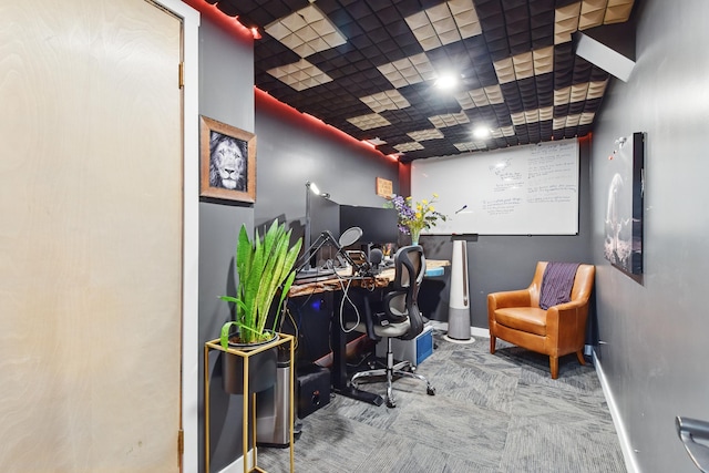 office featuring baseboards and carpet floors