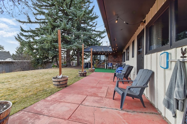 view of patio with fence
