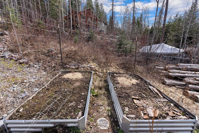 682 Latigo Ln, Bigfork, MT 59911 - view of yard with a garden
