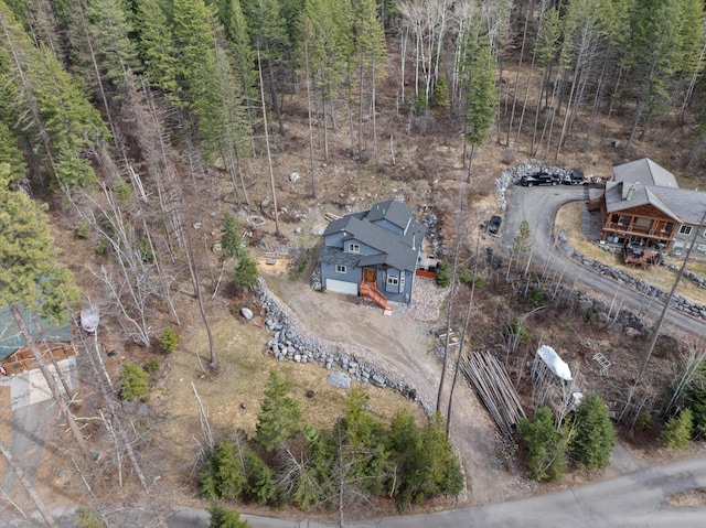 682 Latigo Ln, Bigfork, MT 59911 - aerial view of property's location with a heavily wooded area