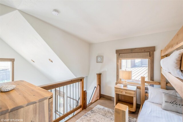 15 Haflinger Cottage Way, Eureka, MT 59917 - bedroom featuring multiple windows and baseboards