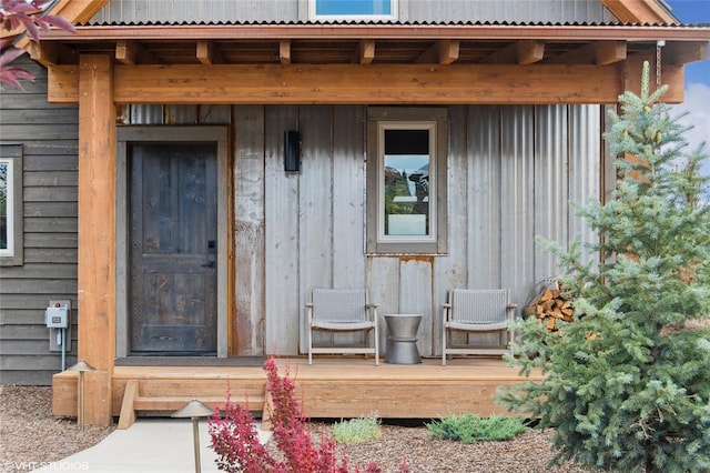 15 Haflinger Cottage Way, Eureka, MT 59917 - doorway to property featuring board and batten siding