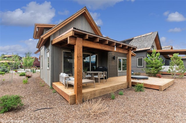 15 Haflinger Cottage Way, Eureka, MT 59917 - rear view of property with a wooden deck
