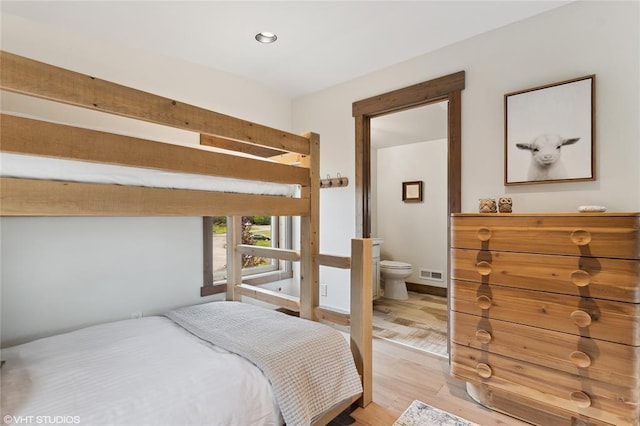 15 Haflinger Cottage Way, Eureka, MT 59917 - bedroom featuring light wood-style floors and recessed lighting