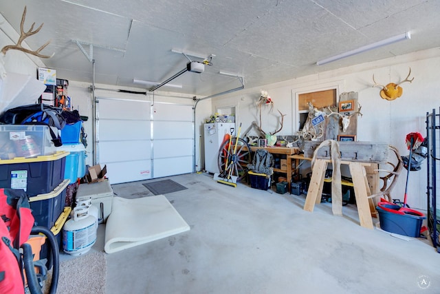 garage with a garage door opener and refrigerator
