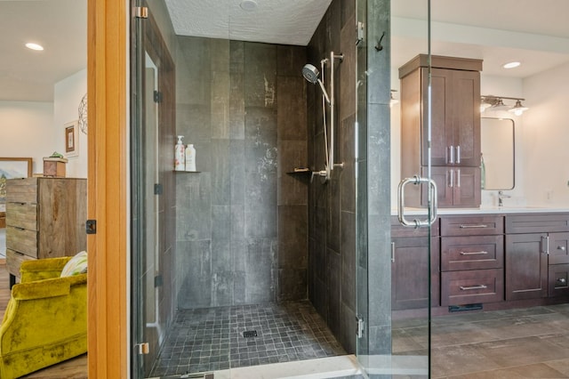 5632 Fairview Ln, Florence, MT 59833 - full bath featuring a stall shower, recessed lighting, and vanity