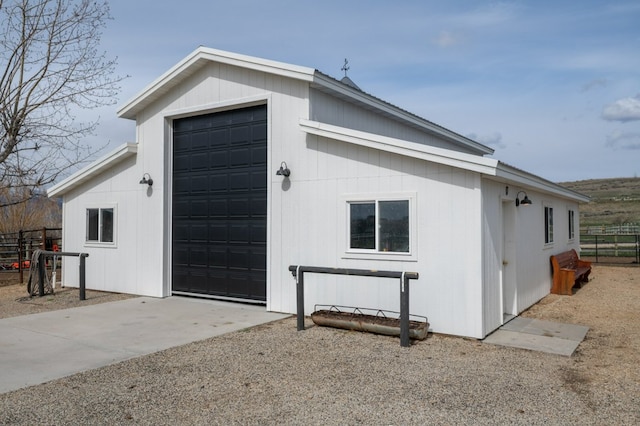 5632 Fairview Ln, Florence, MT 59833 - garage with driveway and fence