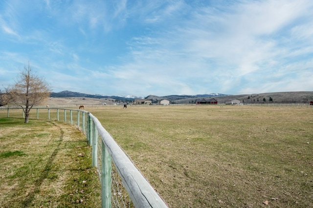 5632 Fairview Ln, Florence, MT 59833 - view of yard with a mountain view, fence, and a rural view