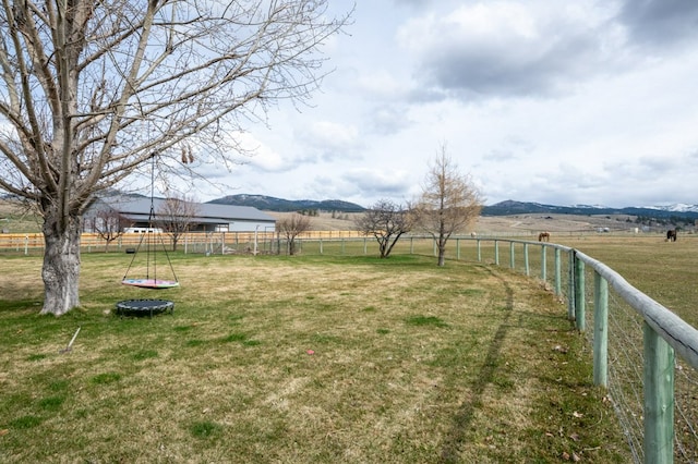 5632 Fairview Ln, Florence, MT 59833 - view of yard featuring fence, a rural view, and a mountain view