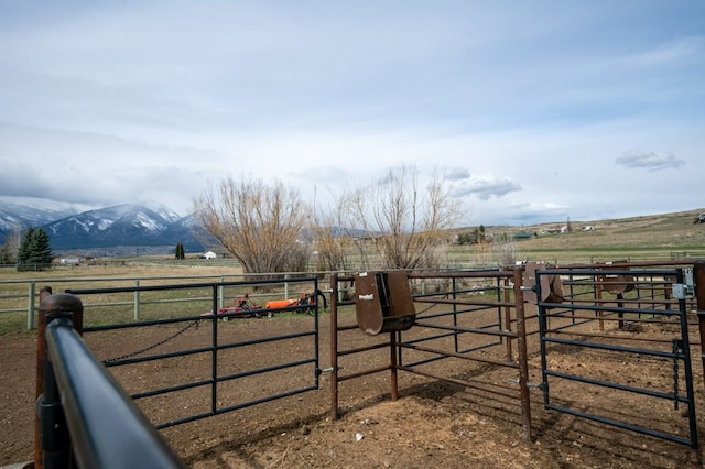 5632 Fairview Ln, Florence, MT 59833 - view of yard featuring an outdoor structure, an exterior structure, a mountain view, and a rural view