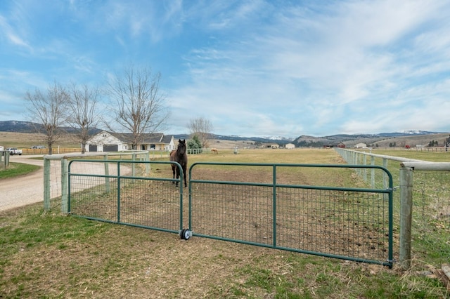 5632 Fairview Ln, Florence, MT 59833 - view of gate with fence and a rural view