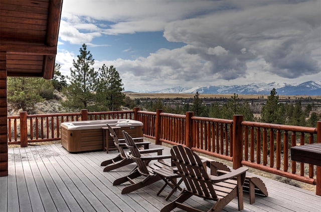 3340 Rome Ln, Stevensville, MT 59870 - wooden deck with a hot tub and a mountain view