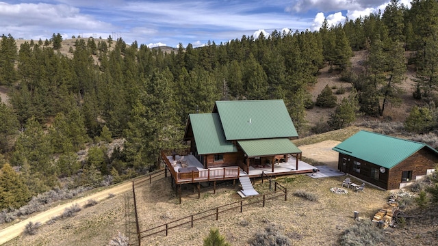 3340 Rome Ln, Stevensville, MT 59870 - aerial view of property and surrounding area with a heavily wooded area