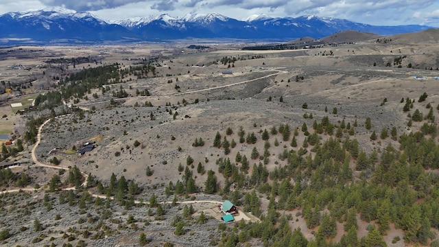3340 Rome Ln, Stevensville, MT 59870 - drone / aerial view of a mountainous background and a desert landscape