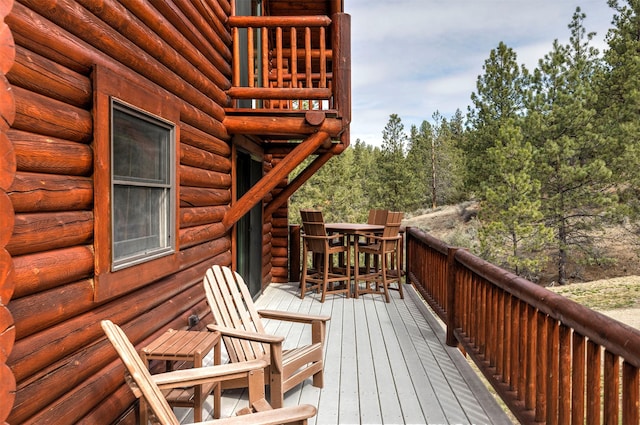 3340 Rome Ln, Stevensville, MT 59870 - wooden terrace with outdoor dining space