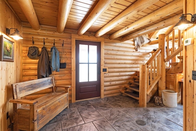 3340 Rome Ln, Stevensville, MT 59870 - foyer with wooden ceiling with exposed beams, stairs, and log walls