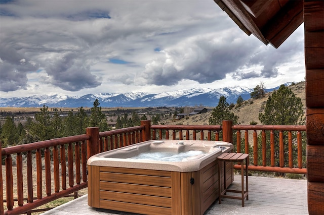 3340 Rome Ln, Stevensville, MT 59870 - wooden terrace featuring a hot tub and a mountain view