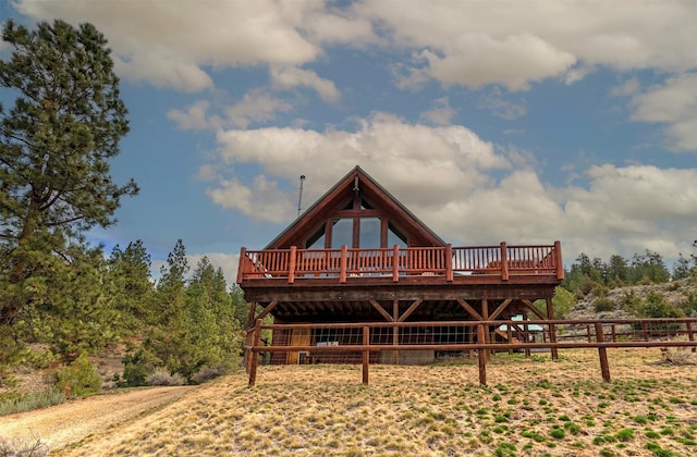 3340 Rome Ln, Stevensville, MT 59870 - back of house featuring a deck