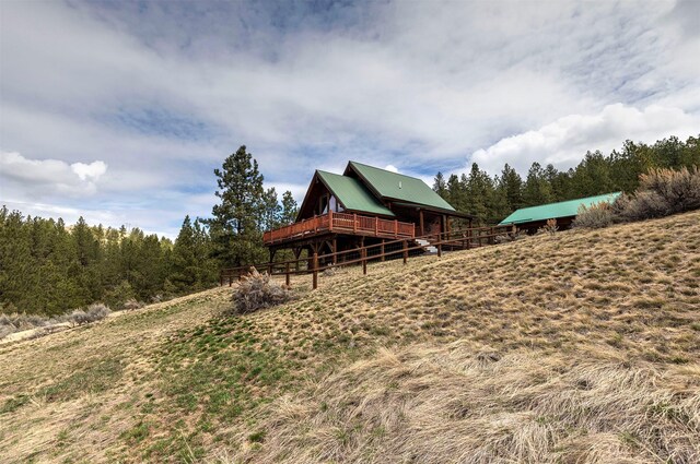 3340 Rome Ln, Stevensville, MT 59870 - view of side of home featuring metal roof
