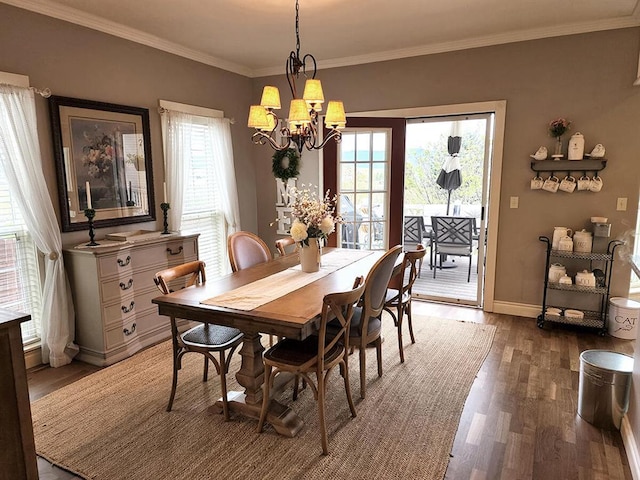 266 W Bowman Dr, Kalispell, MT 59901 - dining room with an inviting chandelier, crown molding, wood finished floors, and baseboards