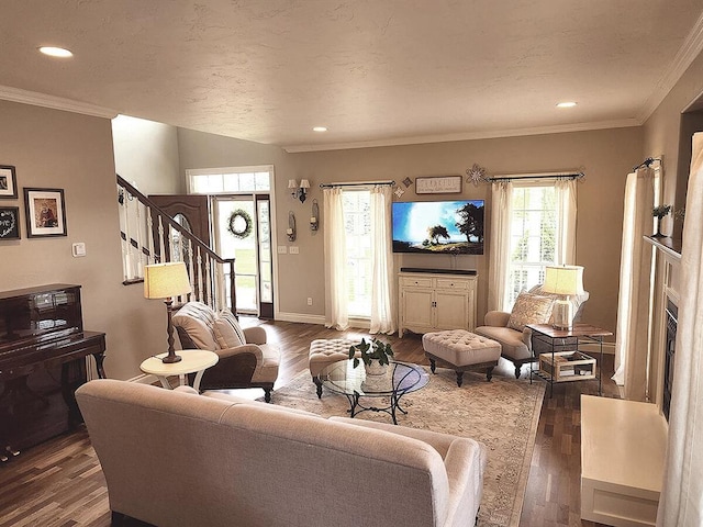 266 W Bowman Dr, Kalispell, MT 59901 - living area featuring dark wood-style floors, stairs, and ornamental molding