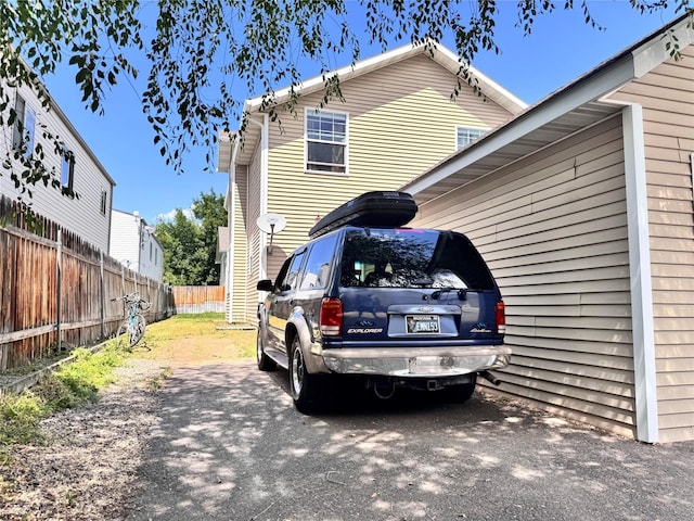 109 Justus Ln, Missoula, MT 59801 - view of home's exterior featuring asphalt driveway