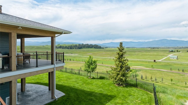 160 Quirk Trl, Eureka, MT 59917 - view of yard featuring a view of countryside, a patio area, and a deck with mountain view
