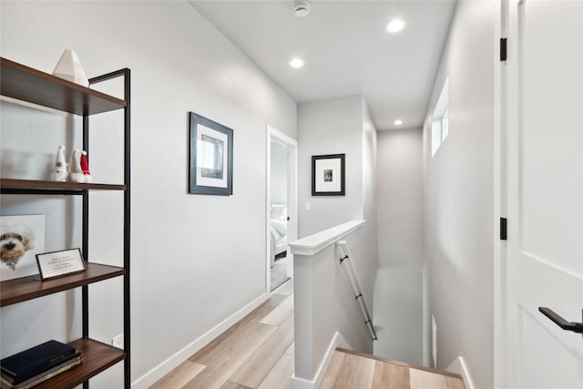 402 Trailview Way, Whitefish, MT 59937 - hallway featuring an upstairs landing, light wood-style flooring, and recessed lighting