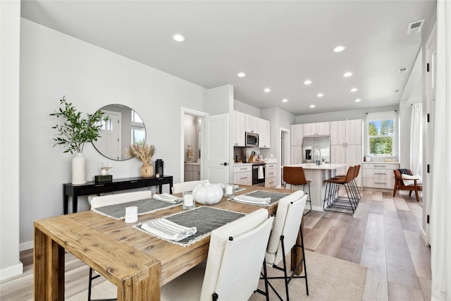 402 Trailview Way, Whitefish, MT 59937 - dining room with light wood-style floors and recessed lighting