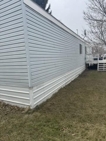 1930 N Hannaford St, Helena, MT 59601 - view of property exterior featuring a lawn