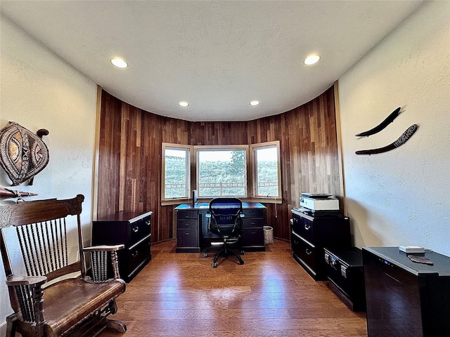 93 Golf Course Dr, Ennis, MT 59729 - office area featuring wood finished floors, recessed lighting, a textured wall, and wooden walls