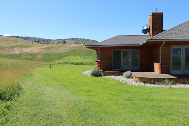 93 Golf Course Dr, Ennis, MT 59729 - view of green lawn featuring french doors and a deck