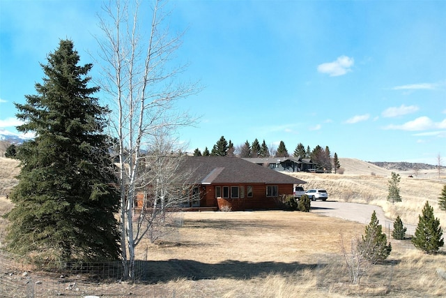 93 Golf Course Dr, Ennis, MT 59729 - view of home's exterior with dirt driveway