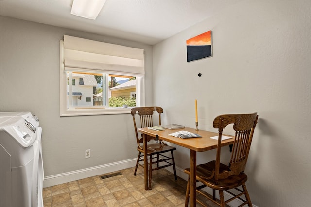 620 Stephens Ave, Missoula, MT 59801 - dining area with washing machine and clothes dryer and baseboards