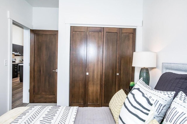 21D Hickory Loop, Whitefish, MT 59937 - bedroom featuring wood finished floors and a closet