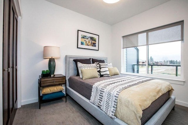 21D Hickory Loop, Whitefish, MT 59937 - bedroom featuring multiple windows