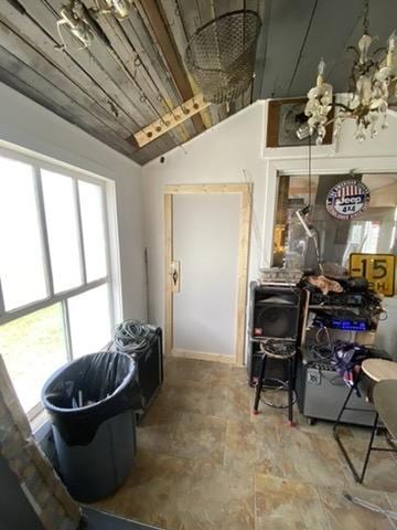 3 W 2nd St, Whitehall, MT 59759 - interior space featuring stone finish flooring and plenty of natural light
