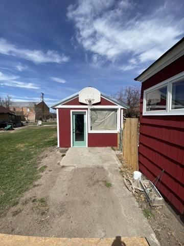 3 W 2nd St, Whitehall, MT 59759 - view of outdoor structure with an outdoor structure and fence