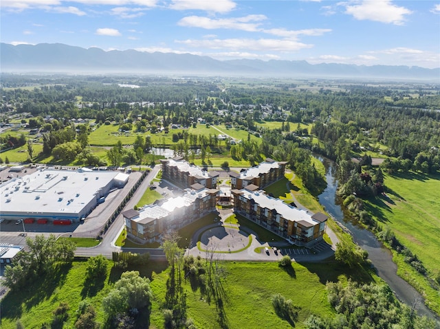 drone / aerial view featuring a mountain view